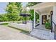 Inviting covered porch with a beautiful patio, stylish lighting, and a welcoming entrance at 439 Atlanta Se Ave, Atlanta, GA 30315