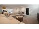 Stylish basement with a sectional sofa, recessed lighting, and a dark accent door at 633 Channing Nw Dr, Atlanta, GA 30318