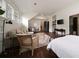 Bright, spacious bedroom with seating area, dining table, and an ensuite bath at 633 Channing Nw Dr, Atlanta, GA 30318