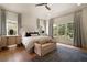 Inviting bedroom with large windows, decorative rug, and comfortable seating at 633 Channing Nw Dr, Atlanta, GA 30318