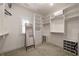 Walk-in closet with built-in shelving and ample storage space at 633 Channing Nw Dr, Atlanta, GA 30318