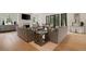 Spacious living room with hardwood floors, neutral furniture, and fireplace at 633 Channing Nw Dr, Atlanta, GA 30318