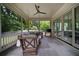 Screened porch with lots of windows provides views of surrounding greenery and outdoor living at 633 Channing Nw Dr, Atlanta, GA 30318