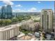 High-rise condominiums with a view overlooking a major roadway and several business buildings at 795 Hammond Dr # 808, Sandy Springs, GA 30328