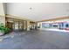 Well-lit building entrance with covered parking and convenient access to the main lobby at 795 Hammond Dr # 808, Sandy Springs, GA 30328