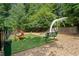 Well-maintained dog park with various play structures and benches for residents' enjoyment at 795 Hammond Dr # 808, Sandy Springs, GA 30328
