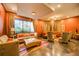 Comfortable and stylish lounge with soft seating, elegant curtains, and great natural light at 795 Hammond Dr # 808, Sandy Springs, GA 30328