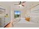 Comfortable main bedroom with access to balcony with outdoor views and hardwood floors at 795 Hammond Dr # 808, Sandy Springs, GA 30328