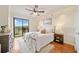 Open and airy main bedroom with outdoor views, walk-in closet and hardwood floors at 795 Hammond Dr # 808, Sandy Springs, GA 30328