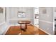 Elegant dining room with wood floors next to an updated kitchen at 903 Tuxworth Cir, Decatur, GA 30033