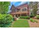Spacious backyard showcasing a patio and deck perfect for outdoor entertaining and relaxation at 3467 Brookleigh Ne Ln, Atlanta, GA 30319