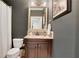 Nicely decorated bathroom with earth tones and includes decorative mirror and modern lighting at 3467 Brookleigh Ne Ln, Atlanta, GA 30319