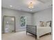 Simple bedroom with carpeted floor, one window, and one queen size bed with mirror leaning on wall at 3467 Brookleigh Ne Ln, Atlanta, GA 30319