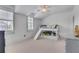 bedroom featuring a bunk bed with slide, two windows with shutters, carpet flooring, and gray walls at 3467 Brookleigh Ne Ln, Atlanta, GA 30319