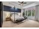 This stunning main bedroom features a canopy bed, tray ceilings, a sitting area, and natural lighting at 3467 Brookleigh Ne Ln, Atlanta, GA 30319