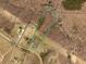 Aerial view of expansive property including land and home with pool, bordered in blue at 400 Old Stagecoach Rd, Carrollton, GA 30116
