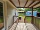 View from the back porch shows a large yard with two outbuildings on the property at 400 Old Stagecoach Rd, Carrollton, GA 30116