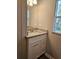 Bathroom featuring a granite counter, white cabinets, and a window with a view at 400 Old Stagecoach Rd, Carrollton, GA 30116