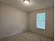 Bedroom featuring carpet floor, neutral colored walls, and a window with blinds at 400 Old Stagecoach Rd, Carrollton, GA 30116