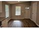 Dining area with white door, window and cabinets, perfect for Gathering meals or hosting guests at 400 Old Stagecoach Rd, Carrollton, GA 30116