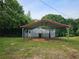 Large outbuilding with metal roof and doors, providing ample storage and shelter at 400 Old Stagecoach Rd, Carrollton, GA 30116