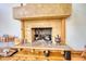 A closer view of the stone fireplace shows wooden beams, and a stone hearth at 5642 N Highway 212, Covington, GA 30016