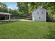 Well-maintained backyard with lush lawn, a charming deck, and ample space for outdoor enjoyment at 22 Peachtree Hills Ne Ave, Atlanta, GA 30305