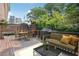 Outdoor deck featuring dining, seating, and a grill, ideal for entertaining or relaxing at 22 Peachtree Hills Ne Ave, Atlanta, GA 30305