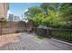 The spacious outdoor deck features both a seating area and a dining area, perfect for outdoor living at 22 Peachtree Hills Ne Ave, Atlanta, GA 30305