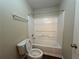 Cozy bathroom featuring a combined tub and shower at 312 Yarbrough Ct, Dacula, GA 30019