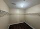 Walk-in closet with wood flooring and wire shelving at 312 Yarbrough Ct, Dacula, GA 30019