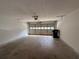 Spacious garage with an automatic door at 312 Yarbrough Ct, Dacula, GA 30019