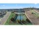 A beautiful aerial view of the neighborhood's amenities including a pool and tennis courts at 513 Forest Ln, Canton, GA 30114