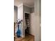 Open coat closet featuring shelving and storage space near front entryway at 513 Forest Ln, Canton, GA 30114