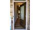 Bright entryway showcasing hardwood floors and a view into the home's layout at 513 Forest Ln, Canton, GA 30114