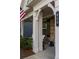 Inviting front porch with decorative columns and space for outdoor seating at 513 Forest Ln, Canton, GA 30114