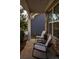 Cozy front porch seating area with rocking chairs, perfect for relaxing outdoors at 513 Forest Ln, Canton, GA 30114