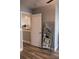 Hallway with a view of an exercise room featuring a full-length mirror at 513 Forest Ln, Canton, GA 30114