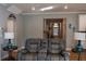 Comfortable living area showcasing neutral walls and a welcoming entrance at 513 Forest Ln, Canton, GA 30114