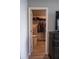 Open walk-in closet with shelving and hanging clothes visible at 513 Forest Ln, Canton, GA 30114