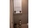 Bathroom with window displaying closed blinds and decoration with two small flower pots at 513 Forest Ln, Canton, GA 30114