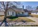 Charming single-story home with a well-maintained front yard, covered porch, and attached garage at 6715 Biscayne Blvd, Rex, GA 30273