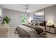 Bedroom features a ceiling fan and lots of natural light at 950 Mill Creek Ave, Canton, GA 30115