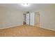 Spacious bedroom with laminate flooring and neutral paint at 950 Mill Creek Ave, Canton, GA 30115