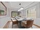 Elegant dining room featuring hardwood floors, fresh paint, and modern decor at 950 Mill Creek Ave, Canton, GA 30115