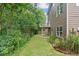 Exterior view of a two-story home featuring a small deck with brown siding at 950 Mill Creek Ave, Canton, GA 30115