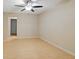 Bright, airy living room with light wood floors and a modern ceiling fan at 950 Mill Creek Ave, Canton, GA 30115