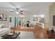 Open concept living room with dining area and a bar, great for entertaining at 950 Mill Creek Ave, Canton, GA 30115