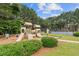 Community playground featuring multiple slides and climbing structures for play at 950 Mill Creek Ave, Canton, GA 30115