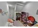 Attic nook features a play area with plush carpet and creative decorations at 9585 Fenbrook Ct, Johns Creek, GA 30022